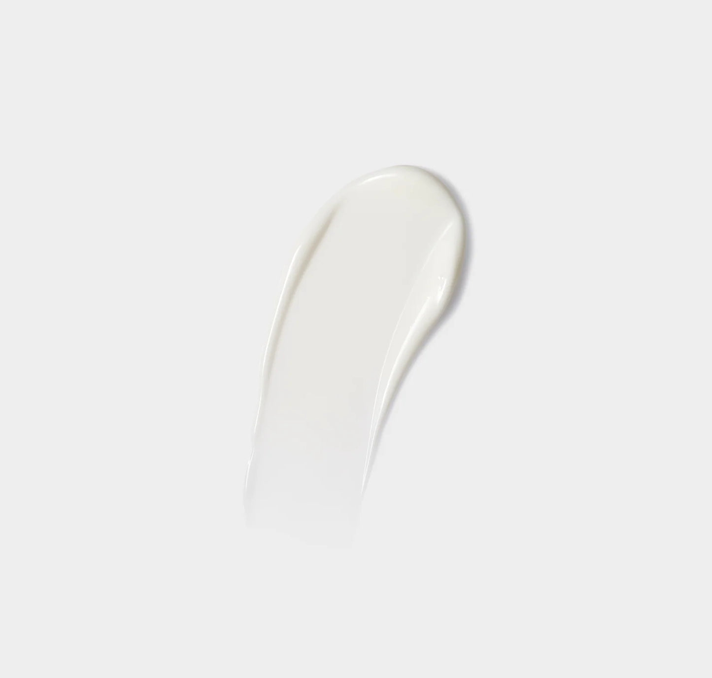 White cream swatch on a light gray background