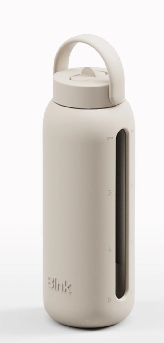 Beige water bottle with a lid on a white background, featuring the brand 'Blink'.