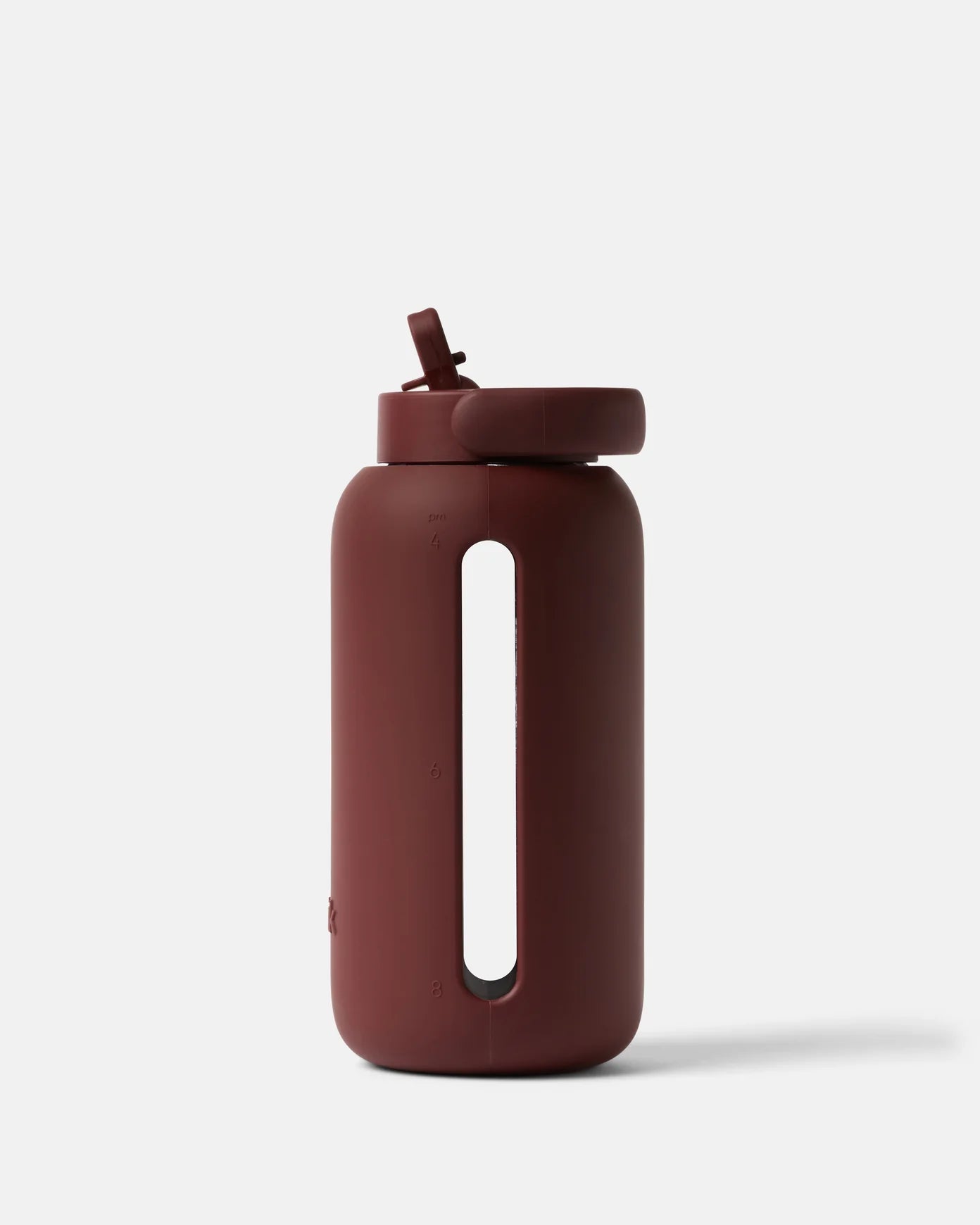 Brown water bottle with a straw on a white background