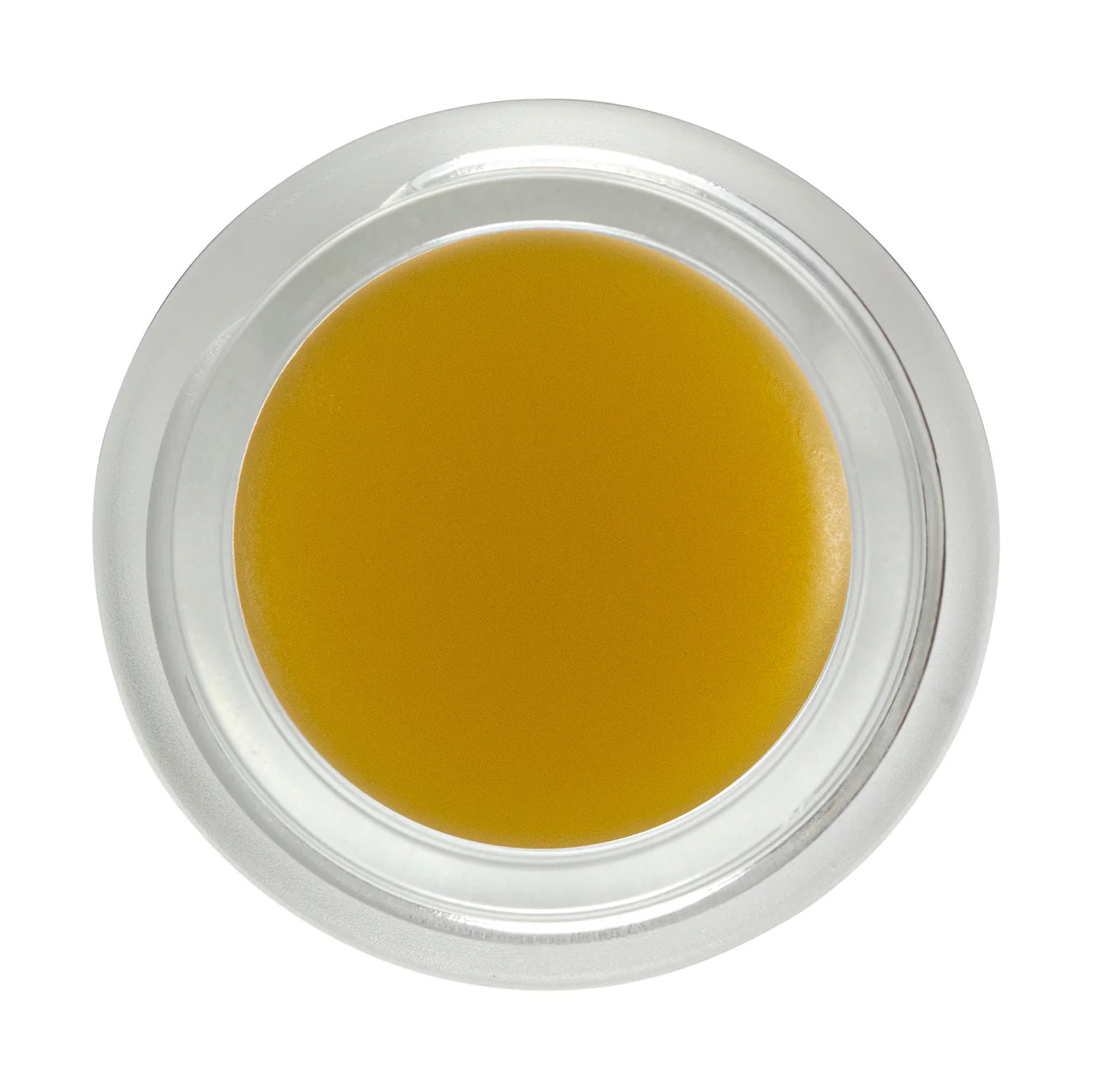 Small container of yellow cream on a white background