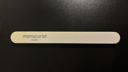 Image Manucurist Nail Buffer - top down view with logo