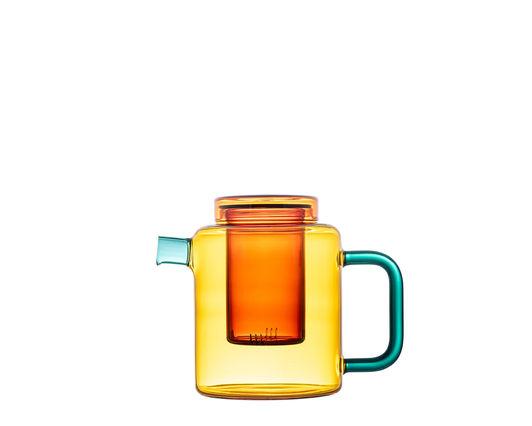 Colorful glass mug with a handle on a white background