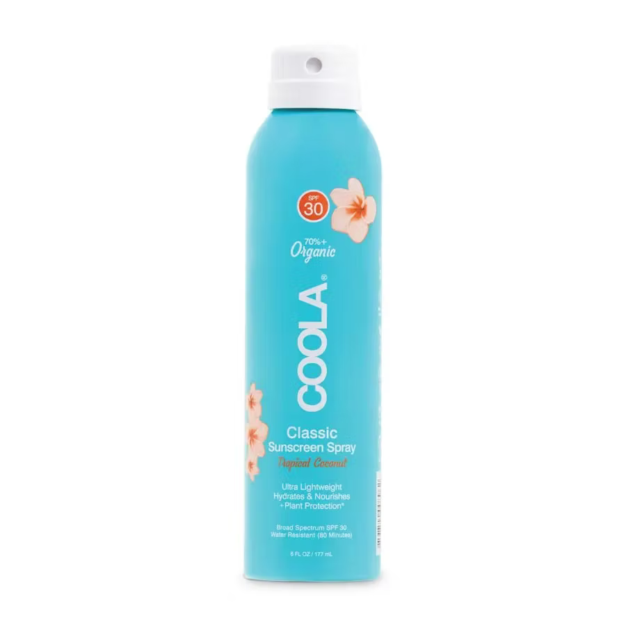 Coola sunscreen spray bottle on a white background