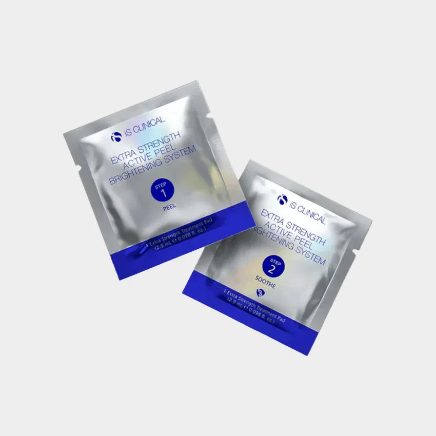 Two skincare peel packets from IS Clinical on a white background